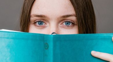 girl-reading-blue-book-sincerely-media-unsplash.jpg